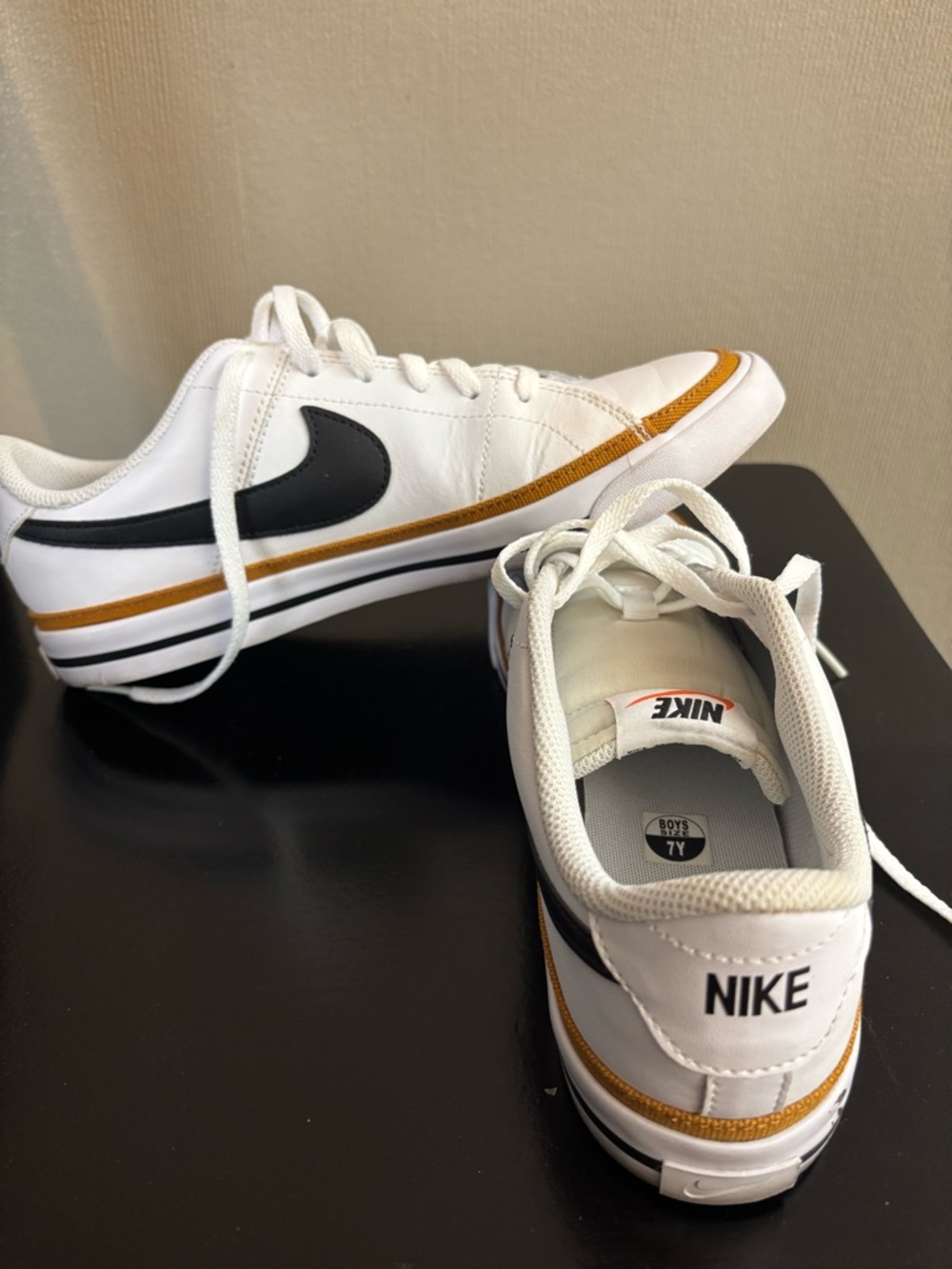 Nike Women’s White Sneakers with Mustard Trim